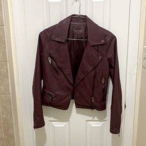 XS Blank NYC burgundy faux leather moto jacket.